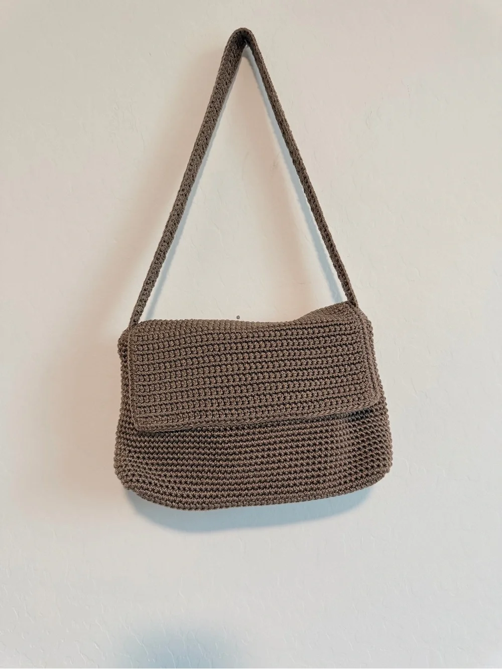 The Sak Brown Crochet Shoulder Bag with Fold-Over Flap
